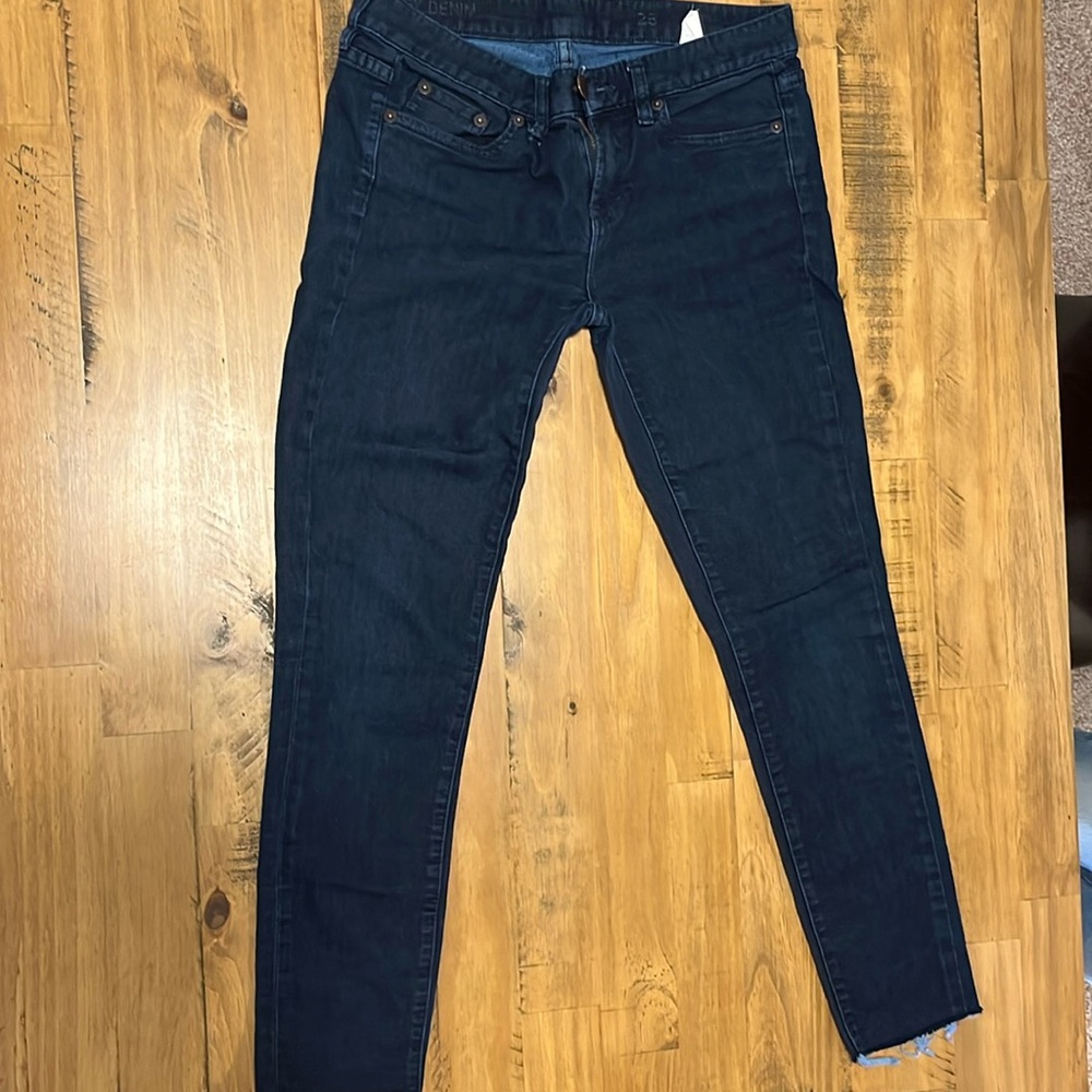 Dark wash J.Crew jeans with cropped frayed edges